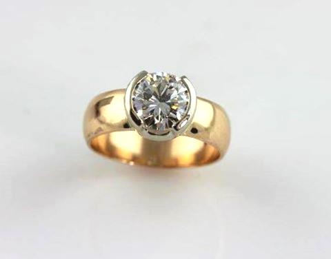 Custom designed 18K white and rose gold engagement ring