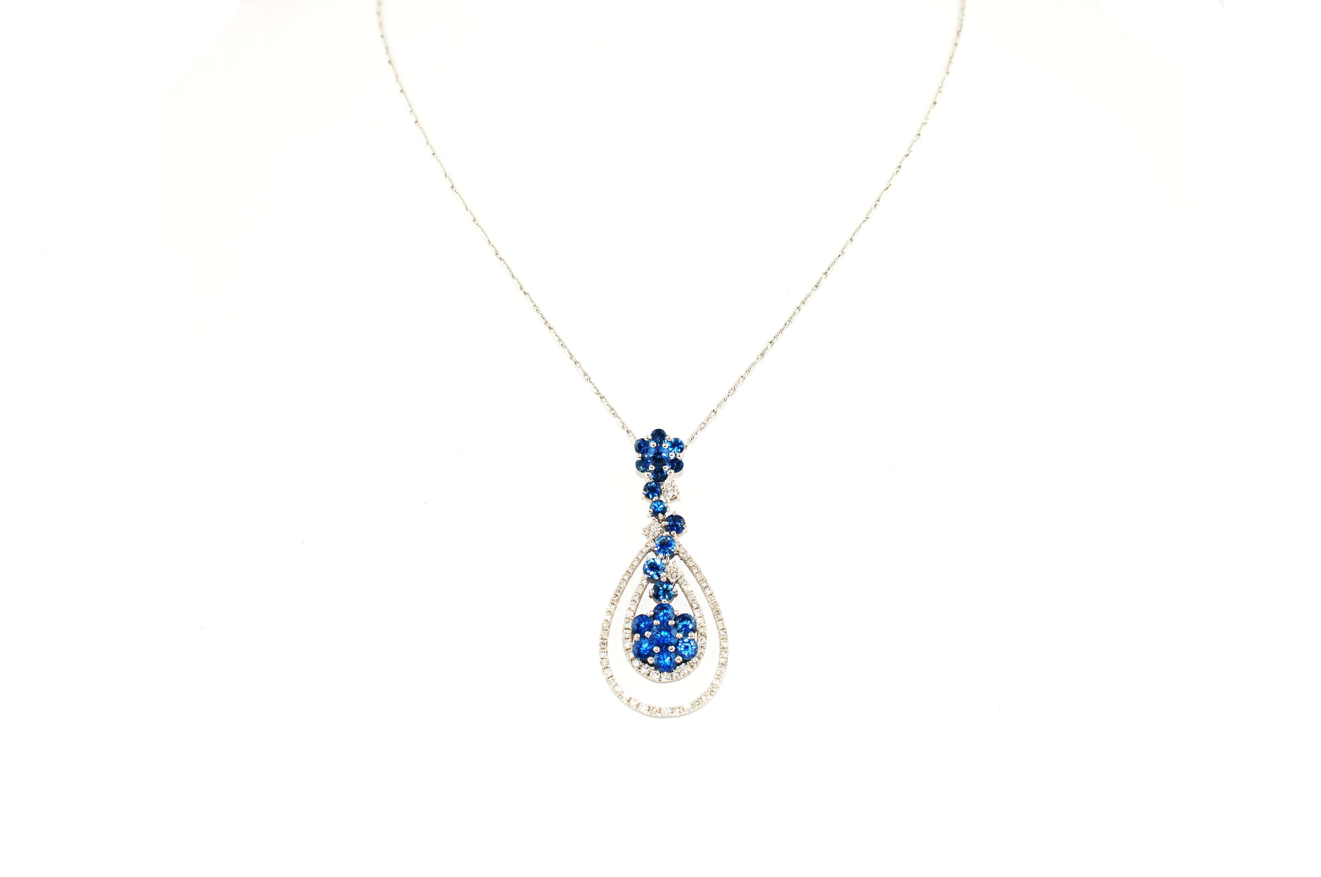 Sapphire and diamond pendant necklace in 14K white gold