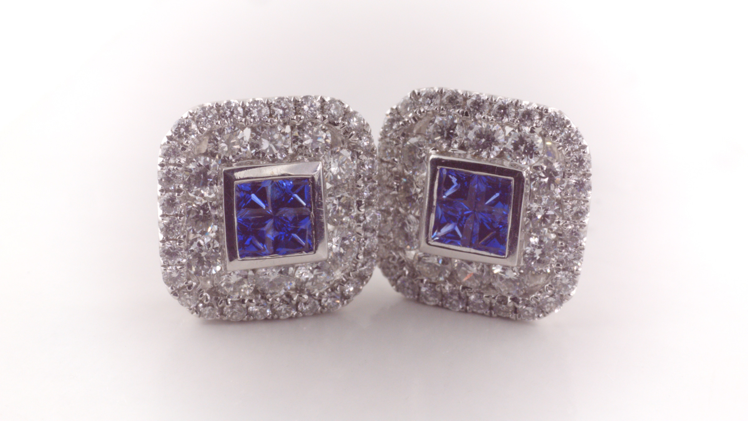 Sapphire and diamond earrings in 18K white gold.