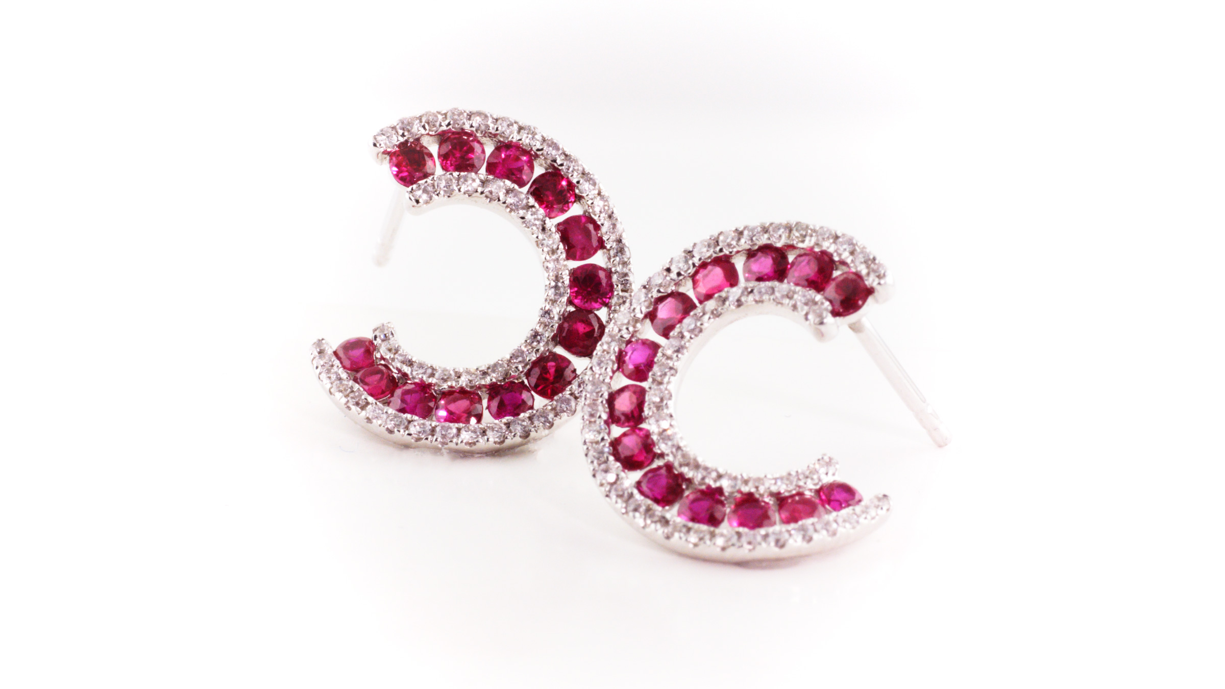 Ruby and diamond earrings in 14K white gold.