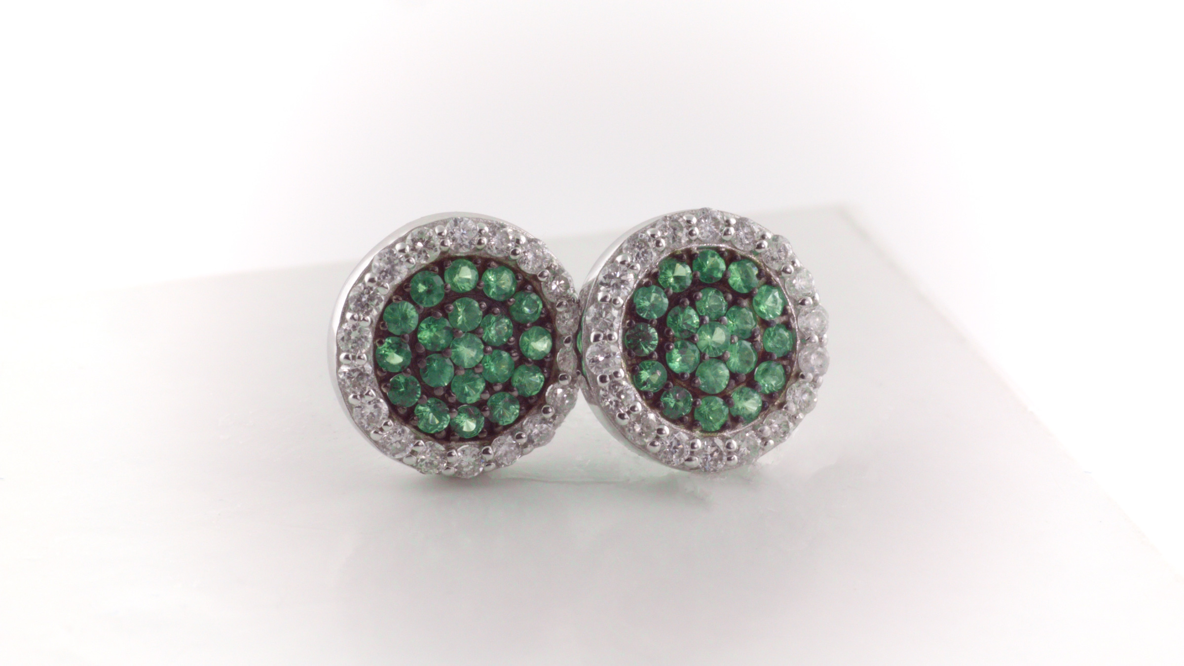 Green tsavorite and diamond earrings in 14K white gold.