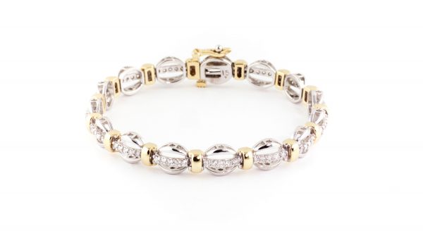 Diamond bracelet in 14K yellow and white gold.