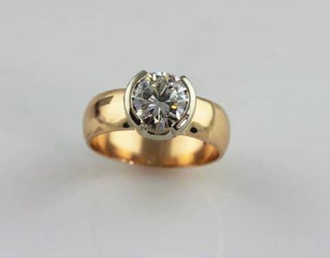 Custom designed 18K white and rose gold engagement ring with 1.70 carat center stone from Barbara Oliver Jewelry