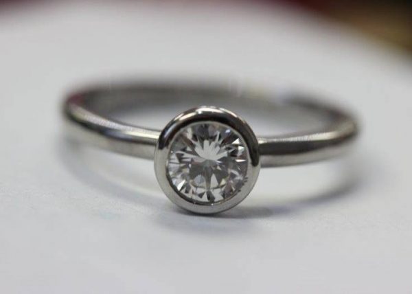 Custom designed bezel set diamond engagement from Barbara Oliver Jewelry