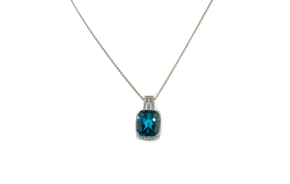 Blue topaz and diamond pendant necklace in 14K white gold